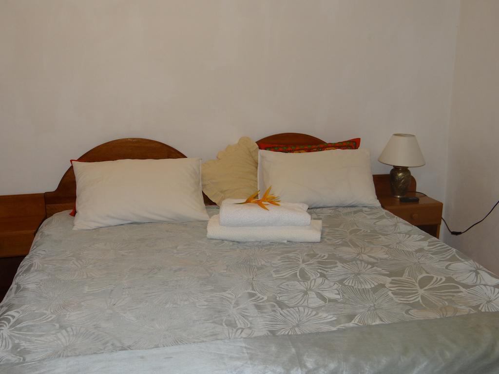 Apartmán The Reef Palm Anse aux Pins Pokoj fotografie